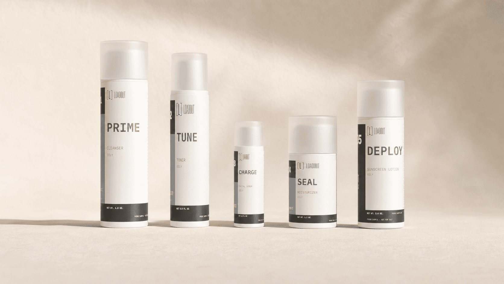 Five LOADOUT skincare bottles in order: PRIME cleanser, TUNE toner, CHARGE serum, SEAL moisturizer and DEPLOY SPF 30